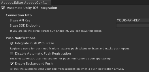 L’éditeur Unity affiche les options de configuration Braze. Dans cet éditeur, les options "Automatiser l'intégration d'Unity iOS", "Intégrer le push avec Braze" et "Activer le push en arrière-plan" sont activées.